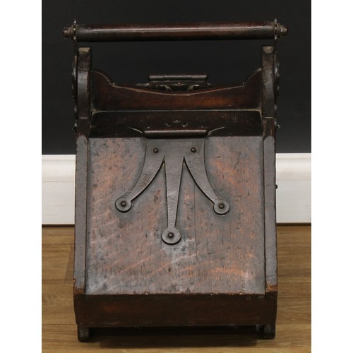 66 - A pair of Neo-Gothic iron-bound oak fuel bins or purdoniums, 44.5cm high, 33.5cm wide, 59.5cm deep