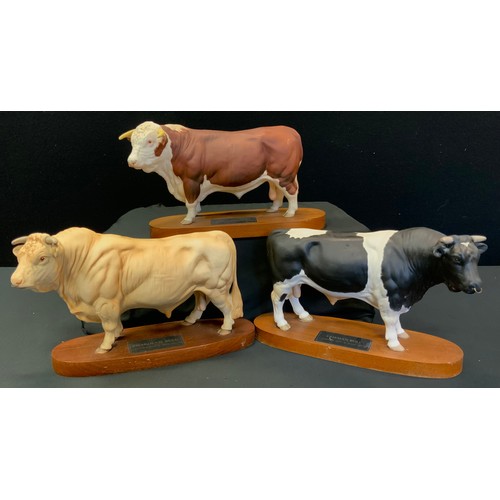 71 - A Beswick Connoisseur model of a Hereford Bull; others Friesian Bull & Charolais Bull, wooden plinth... 