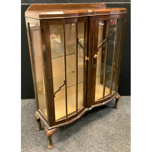 72 - A 1940's mahogany china display cabinet, canted, break-front centre, glazed doors and sides, cabriol... 