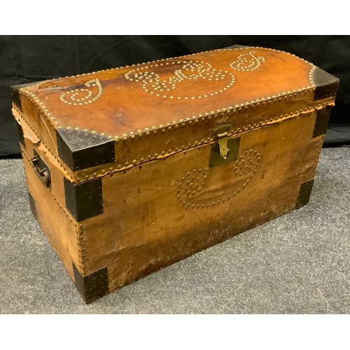 76 - A late 19th early 20th century leather studded dome top chest, 44cm high, 77cm wide