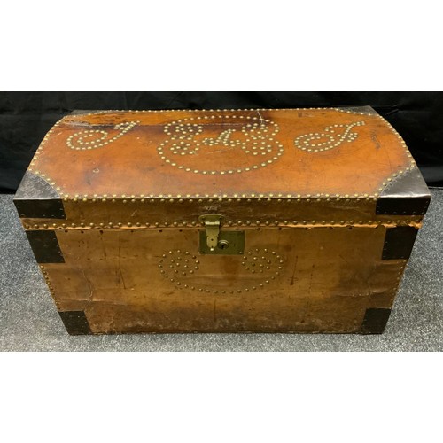 76 - A late 19th early 20th century leather studded dome top chest, 44cm high, 77cm wide