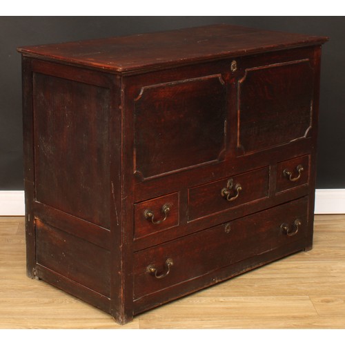 80 - An 18th century oak mule chest, hinged rectangular top above an arrangement of four drawers, 90.5cm ... 