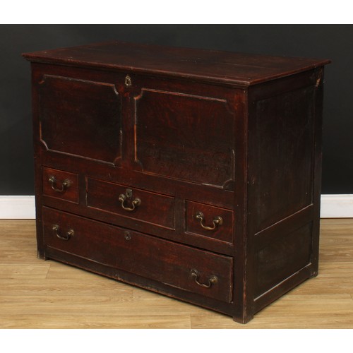 80 - An 18th century oak mule chest, hinged rectangular top above an arrangement of four drawers, 90.5cm ... 