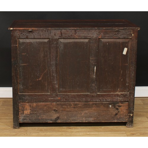 80 - An 18th century oak mule chest, hinged rectangular top above an arrangement of four drawers, 90.5cm ... 