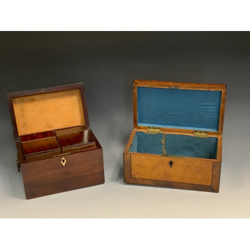 129 - A 19th century mahogany rectangular tea caddy, the interior with two lidded compartments, loose ring... 