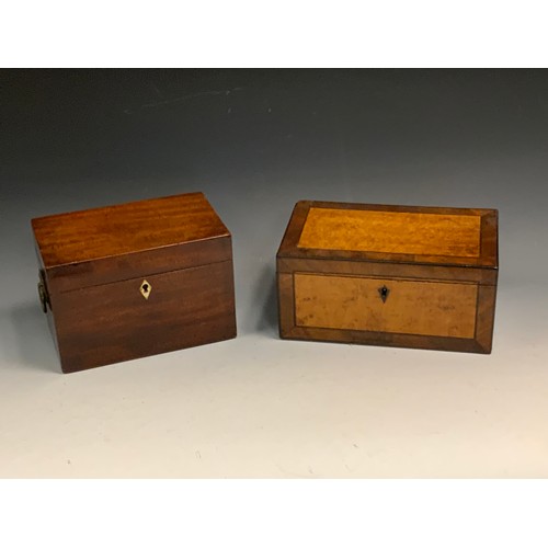 129 - A 19th century mahogany rectangular tea caddy, the interior with two lidded compartments, loose ring... 