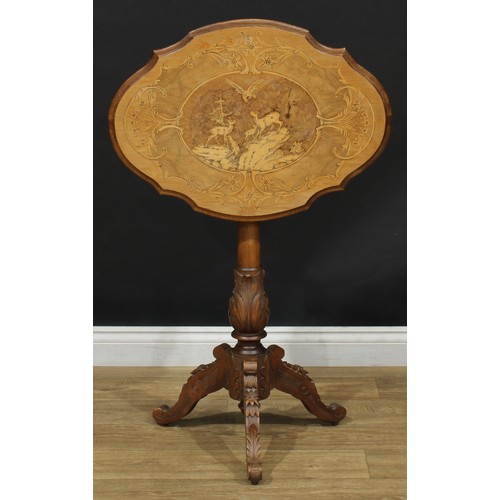 262 - An Italian Sorrento style walnut and marquetry occasional table, shaped oval tilting top inlaid with... 