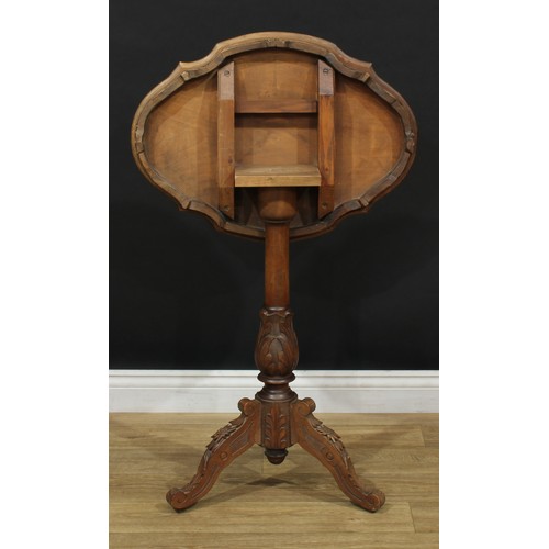 262 - An Italian Sorrento style walnut and marquetry occasional table, shaped oval tilting top inlaid with... 