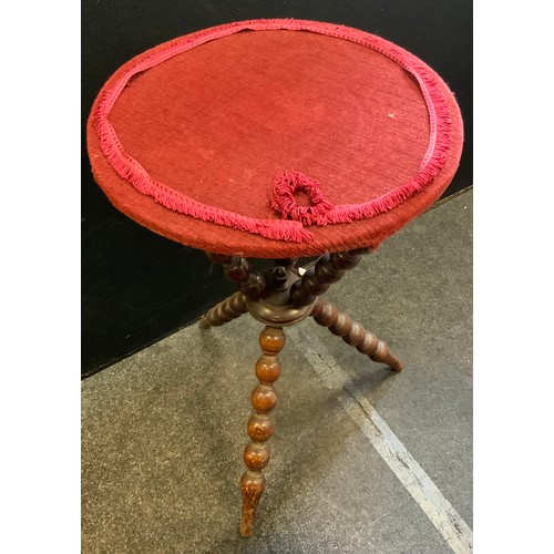 68 - A late Victorian bobbin turned gypsy table, on tripod legs and associated top upholstered with a red... 