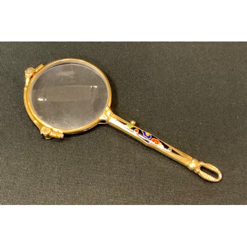 692 - A rolled gold enamel lorgnette, the handle in tones of red, green and blue within a black ground, ci... 