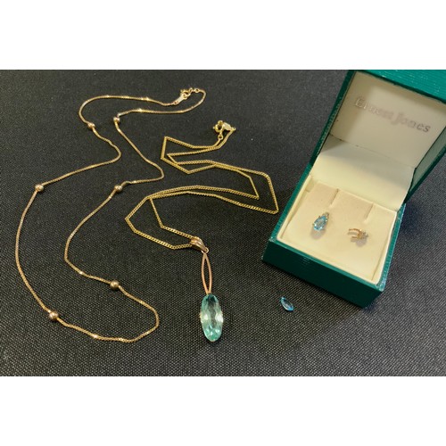 702 - A 9ct gold ball and box link necklace, 3.4g;  pale blue topaz pendant, stamped 9ct, gold plated chai... 