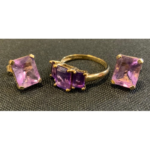 711 - A vibrant purple amethyst platform ring, 9ct gold shank, size N/O, 2.7g gross;  pair of similar rect... 