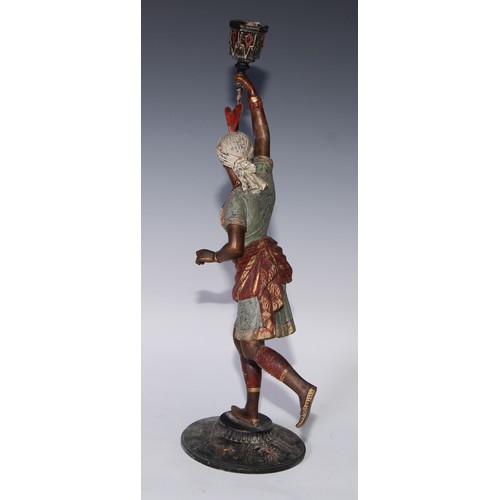 121 - A pair of cold painted blackamoor candlesticks, cast in the Orientalist taste as turbaned figures, 4... 