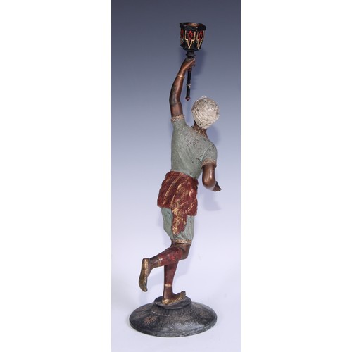 121 - A pair of cold painted blackamoor candlesticks, cast in the Orientalist taste as turbaned figures, 4... 