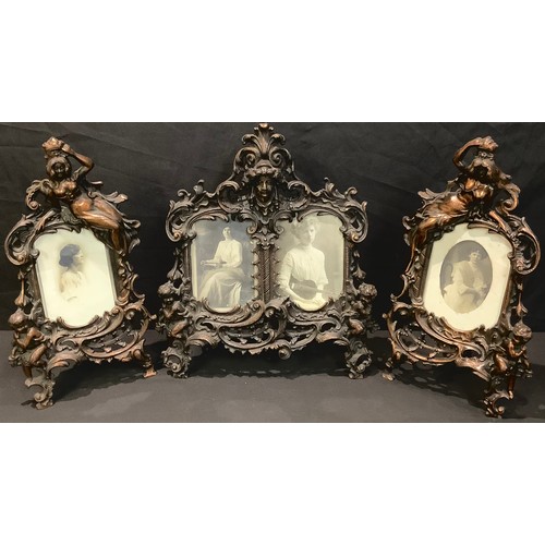 183 - A set of three Beatrice Baroque style cast coppered metal photograph frames