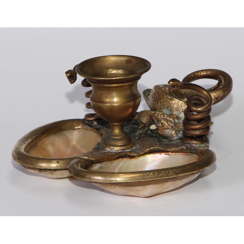 188 - A French Palais Royale gilt brass and mother of pearl chamberstick, naturalistically cast with a liz... 