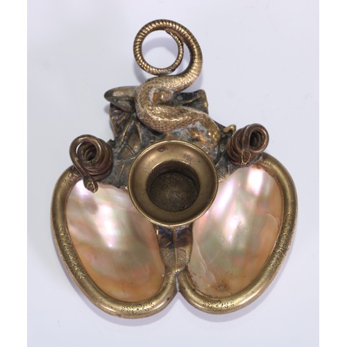 188 - A French Palais Royale gilt brass and mother of pearl chamberstick, naturalistically cast with a liz... 