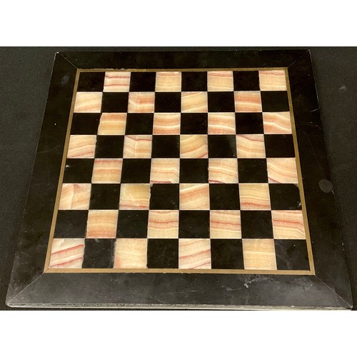 223 - A pietra dura chess board, 26cm wide