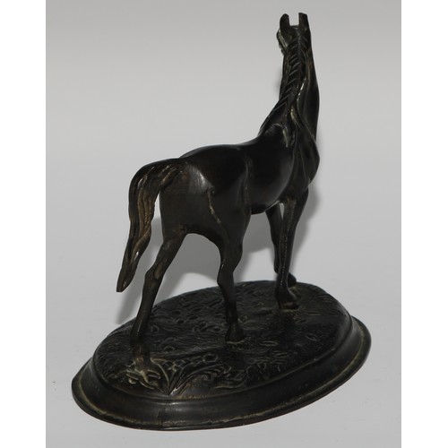 233 - A Continental dark patinated desk sculpture, cast as a horse, oval base, 13.5cm high