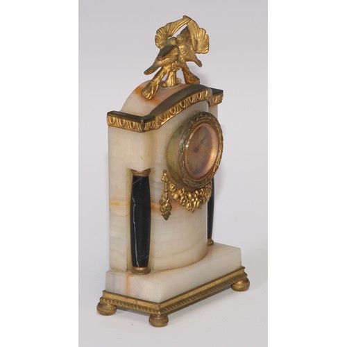 368 - An Empire design gilt metal and black marble mounted onyx diminutive timepiece, 3cm gilt engine turn... 