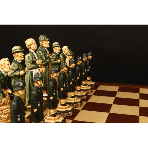 292 - Sherlock Holmes Interest - a Studio Anne Carlton Sherlock Holmes chess set, boxed with literature an... 