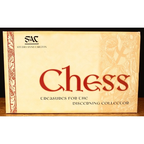 292 - Sherlock Holmes Interest - a Studio Anne Carlton Sherlock Holmes chess set, boxed with literature an... 