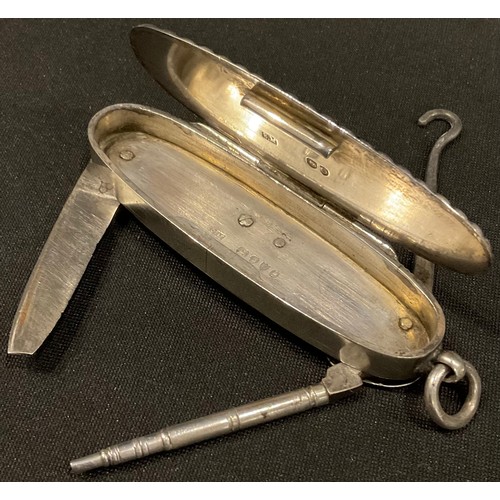 383 - A Victorian silver reeded oval vesta case, with integral propelling pencil, steel pocket knife and b... 