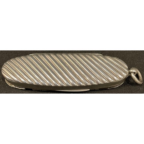 383 - A Victorian silver reeded oval vesta case, with integral propelling pencil, steel pocket knife and b... 