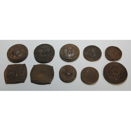 440 - An interesting collection of iron die stamps, various motifs, a rose, bagpipes, Supercar, etc