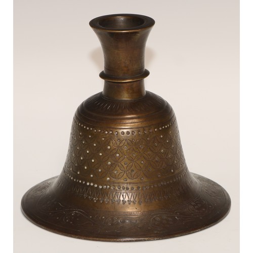 450 - A Middle Eastern bronze bell shaped hookah base, chased in the Islamic taste with intersecting round... 