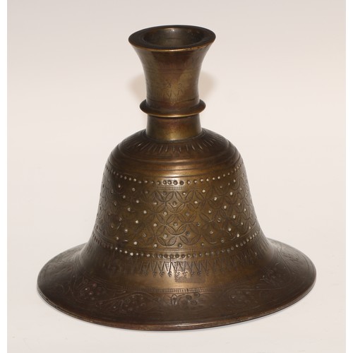 450 - A Middle Eastern bronze bell shaped hookah base, chased in the Islamic taste with intersecting round... 