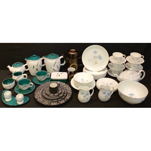 472 - A Wedgwood Ice Rose part tea and breakfast service comprising teapot, plates, bowls, cream jugs, cup... 