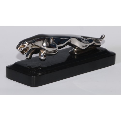 494 - Automobilia - a Jaguar car mascot, mounted for the desk, 18.5cm long