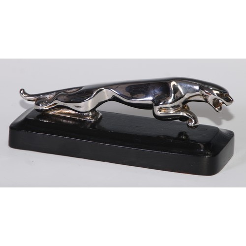 494 - Automobilia - a Jaguar car mascot, mounted for the desk, 18.5cm long