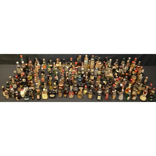 505 - A collection of miniature spirits and liqueurs, whiskies, Dry Fly Sherry 1959, Napoleon Brandy from ... 