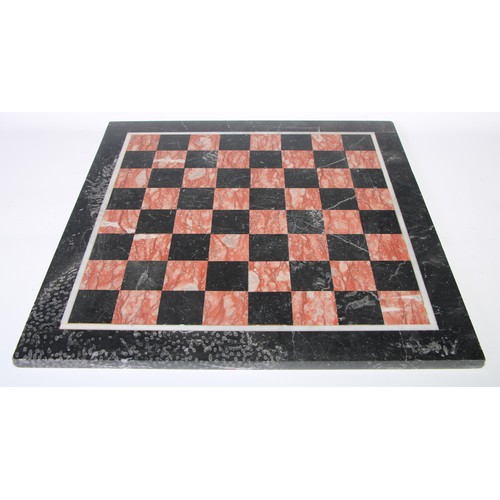 513 - A large pietra dura marble chess board, 49.5cm x 49cm