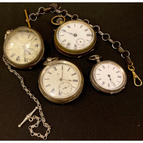 524 - A silver open face pocket watch, Birmingham hallmarks; another, London hallmarks; a silver fob watch... 