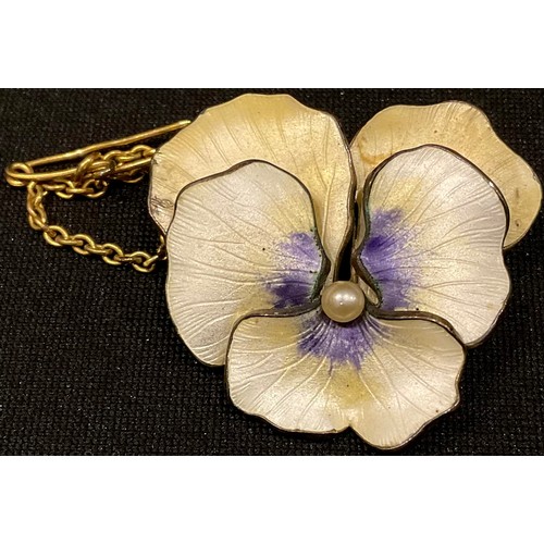 549 - A gilt and enamel brooch as a pansy flower head, enamelled in white with accents of yellow and laven... 