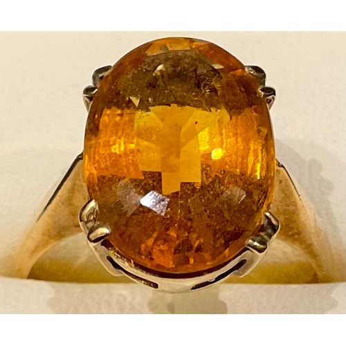 570 - A 9ct gold ring, set with a single faceted oval citrine, ring size Q, 4.47g; a 9ct gold ring set wit... 