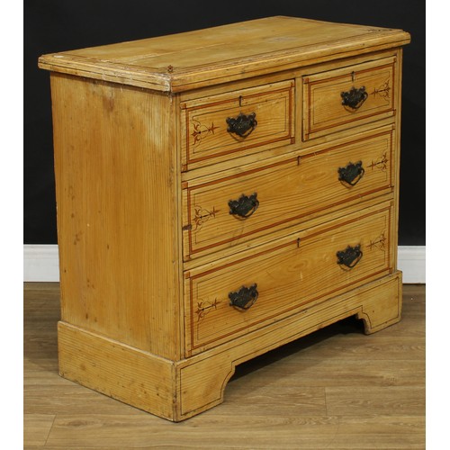 9 - A Victorian scumbled and painted chest, rectangular top above two short and two long drawers, swing ... 