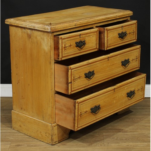 9 - A Victorian scumbled and painted chest, rectangular top above two short and two long drawers, swing ... 