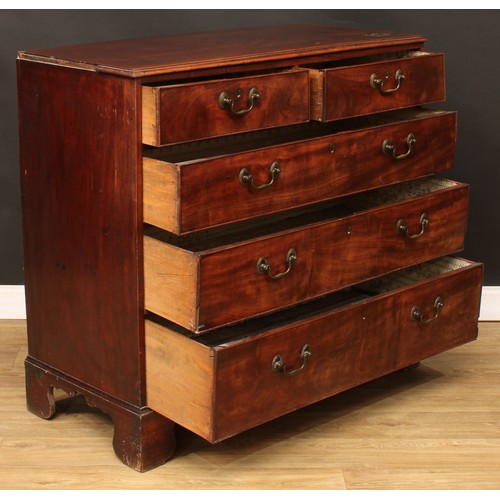 104 - A George III mahogany chest, of two short over three long graduated drawers, skirted base, bracket f... 