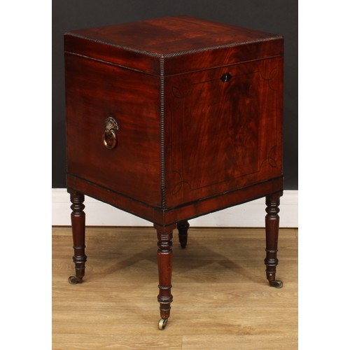 105 - A Regency mahogany teapoy, of cellarette form, hinged cover enclosing a zinc tea caddy, another and ... 