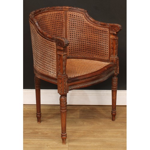 113 - A late 19th/early 20th century French bergère desk chair or fauteuil, double-caned back, 78.5cm high... 