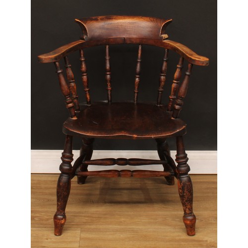 115 - A 19th century lath back armchair, 115.5cm high, 59cm wide, the seat 36cm wide and 40cm deep; a smok... 