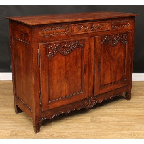 110 - A French cherry enfilade or buffet serving sideboard, slightly oversailing top with chamfered forean... 