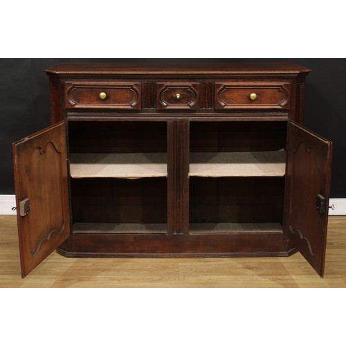 120 - A 19th century French oak enfilade or buffet serving sideboard, slightly oversailing top with canted... 