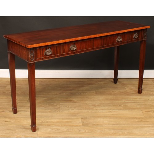 209 - An Adam style serving table, rectangular top above three frieze drawers, tapered square legs, spade ... 