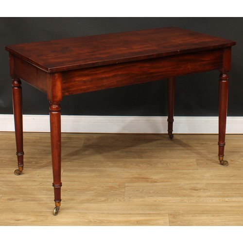 213 - A 19th century mahogany side or serving table, rectangular top above a long frieze drawer, turned le... 