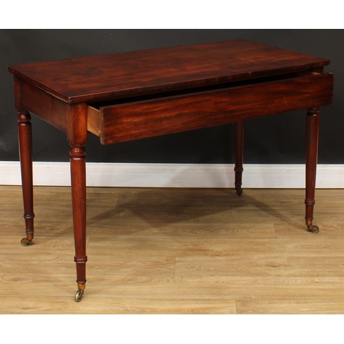 213 - A 19th century mahogany side or serving table, rectangular top above a long frieze drawer, turned le... 